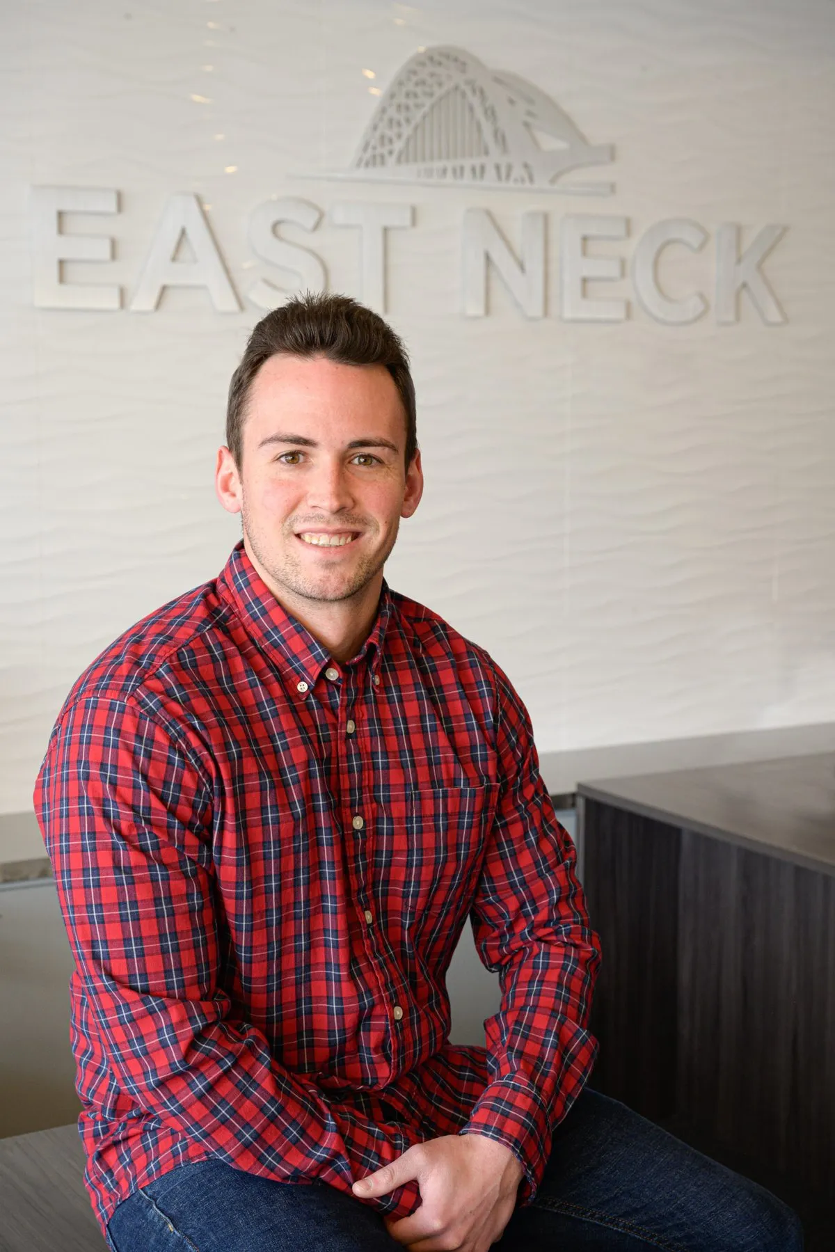 A member of the East Neck Insurance team in the office